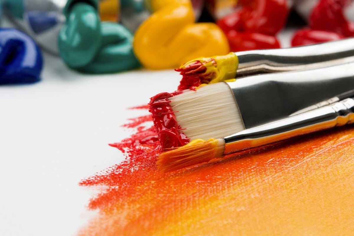 Students painting in the visual arts studio