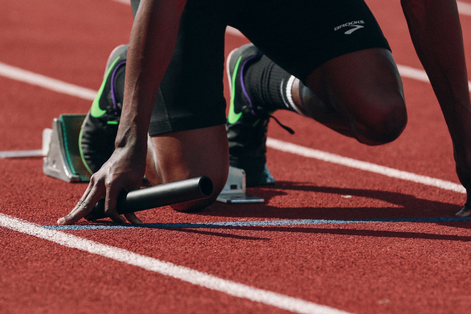 Students on the athletics track during the sports period